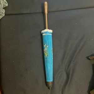 A blue aesthetic umbrella from the renaissance fair.